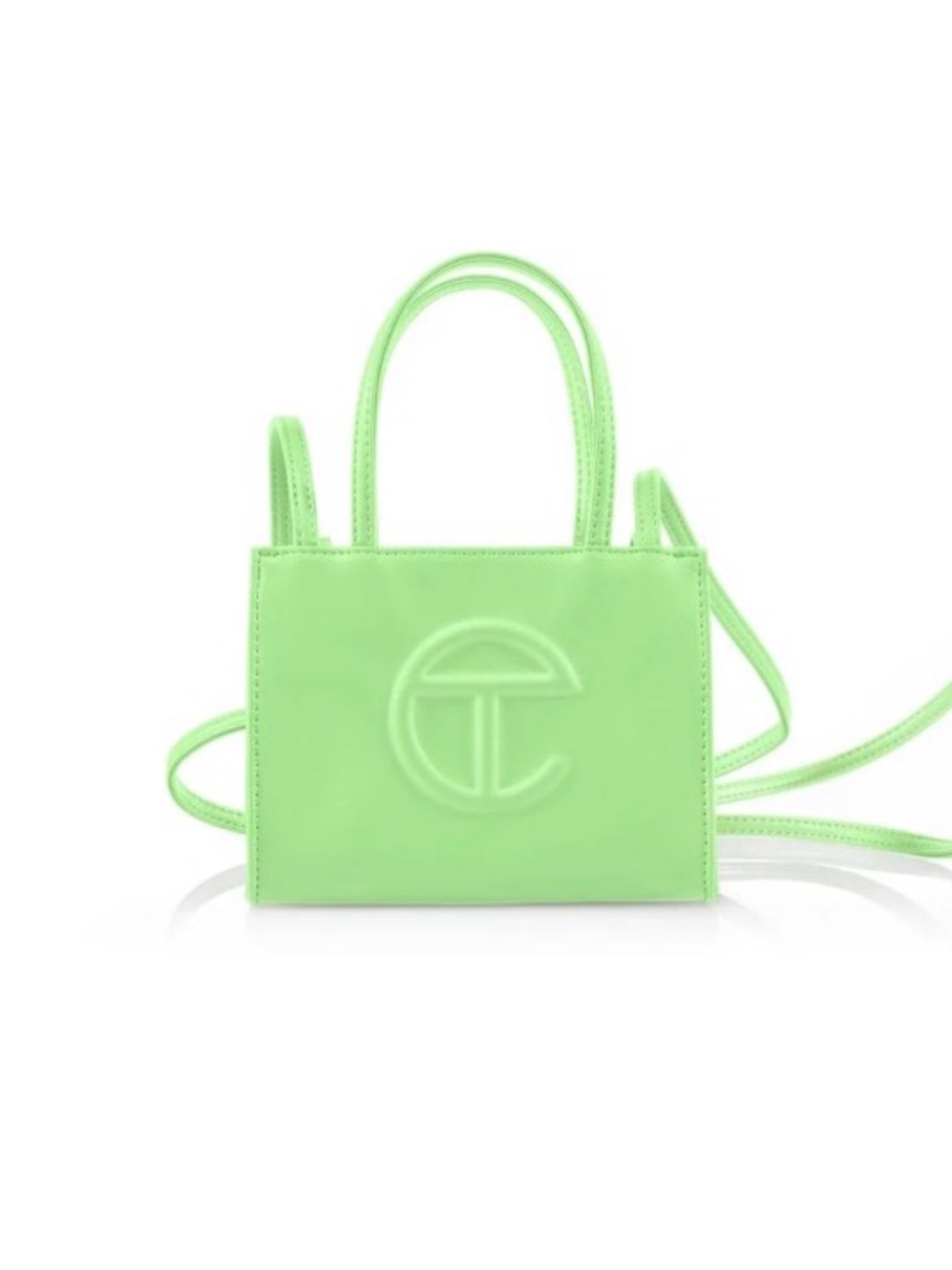 Small mint Telfar shopping bag.